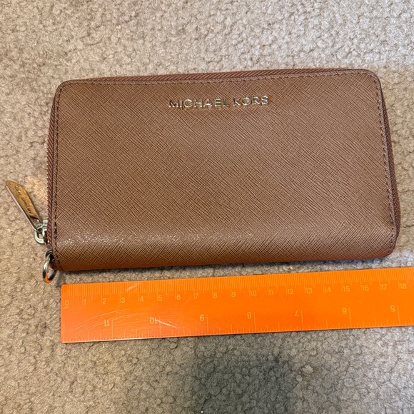 Michael Kors Handbags - Michael Kors Tan Zip Wallet